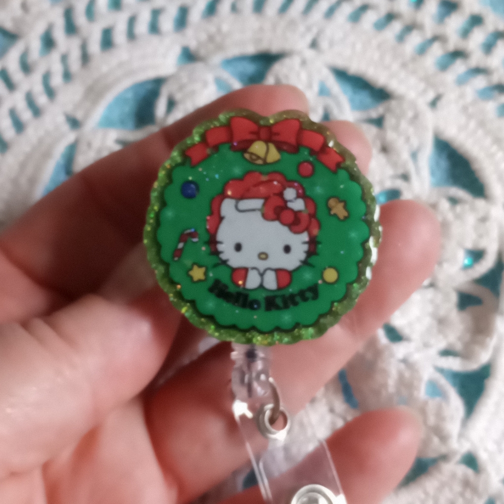 Hello kitty Christmas badge reel